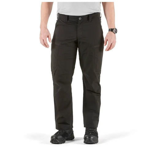 A person wearing black cargo pants on a white background