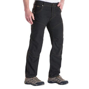 Person wearing black pants on a white background