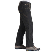 Black pants worn by a person on a white background