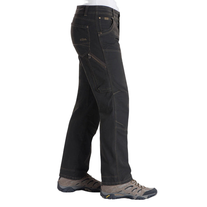 Black pants worn by a person on a white background