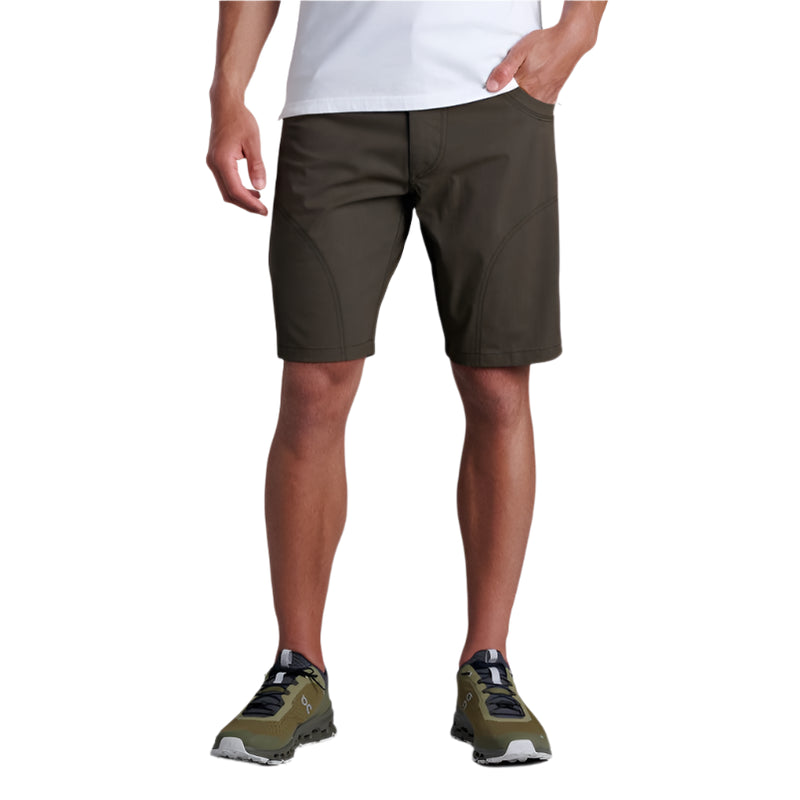 Person wearing dark gunmetal grey shorts on a white background
