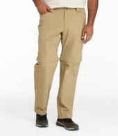 Beige pants worn by a person on a white background
