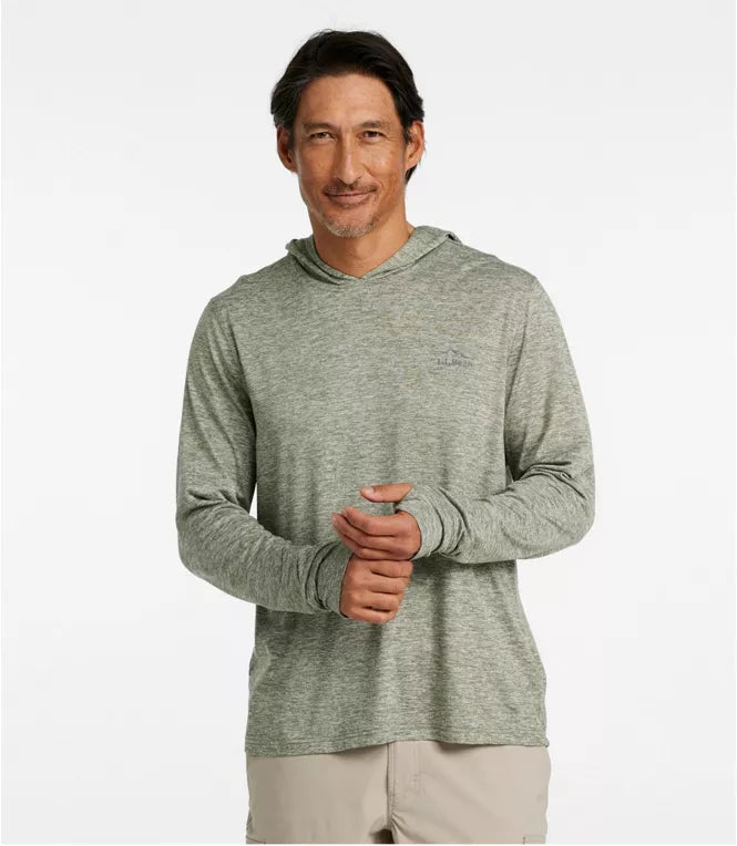 Man wearing a green hoodie on a white background