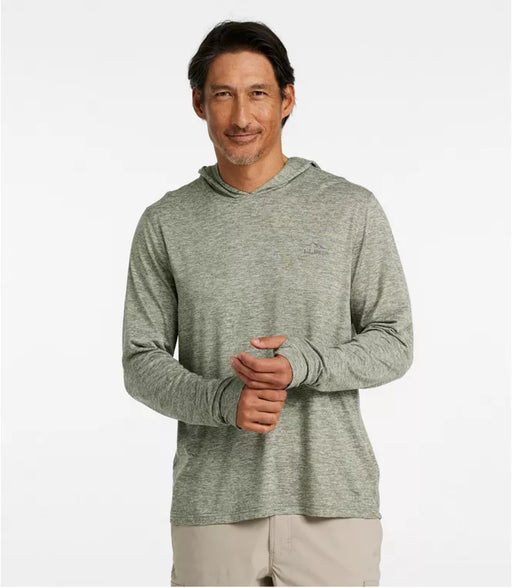 Man wearing a green hoodie on a white background