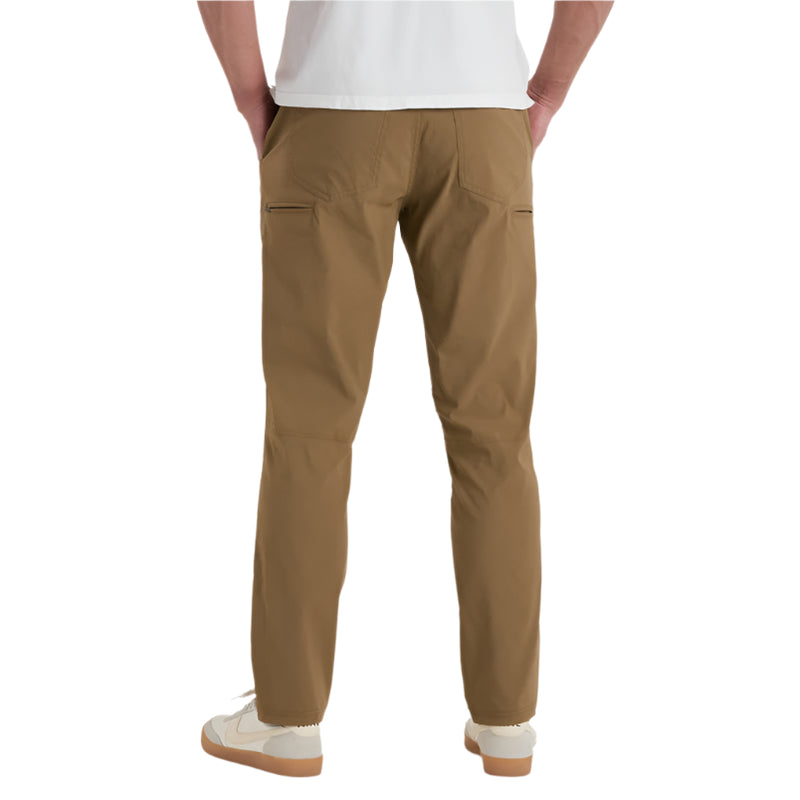 Person wearing brown pants on a white background