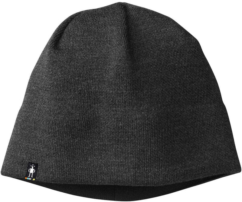A black beanie hat on a white background