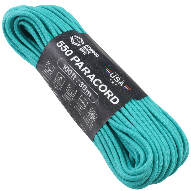 A coiled turquoise rope with a black paper label that reads '550 PARACORD' and '100 ft / 30m', photographed on a plain white background.