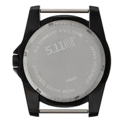 The gray bottom of a black watch on a white background