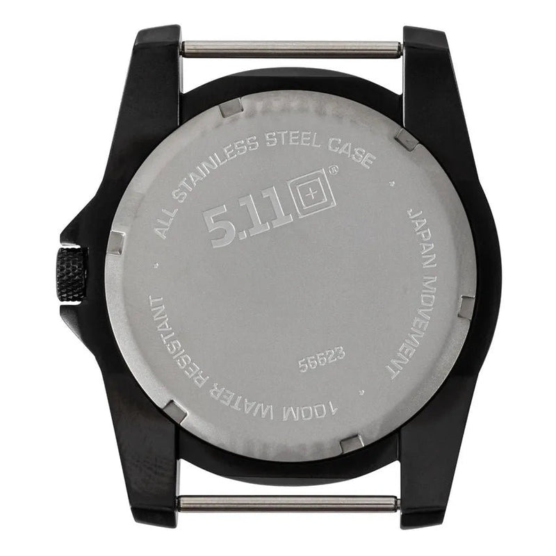 The gray bottom of a black watch on a white background