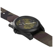 A camo patterned watch with a dial on the side on a white background