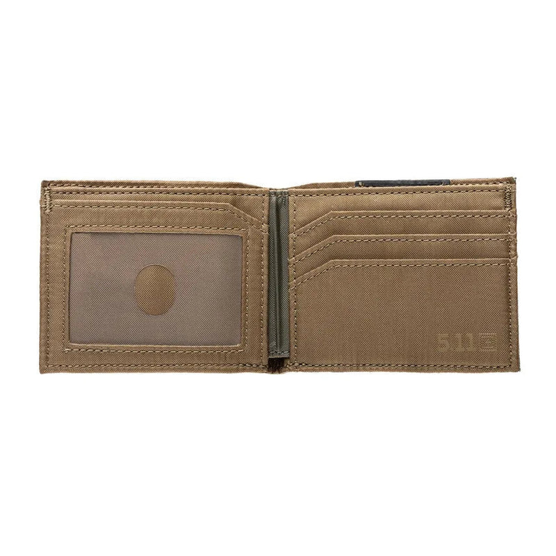 A open light camo wallet with a brown inside on a white background