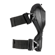 A black knee pad from the side on a white background 