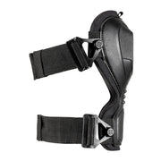 A black knee pad from the side on a white background 