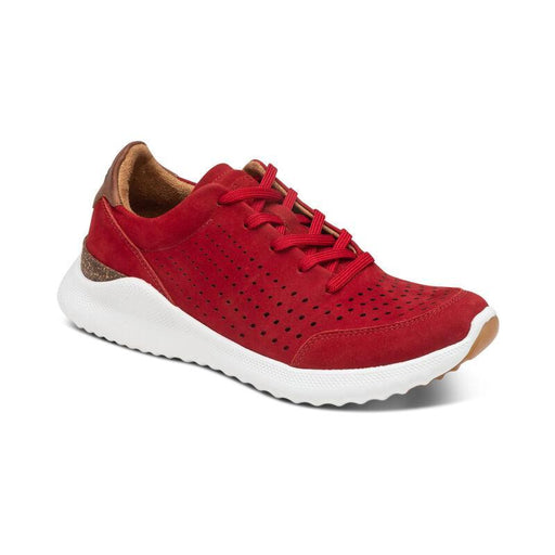 A red sneaker with a white bottom on a white background
