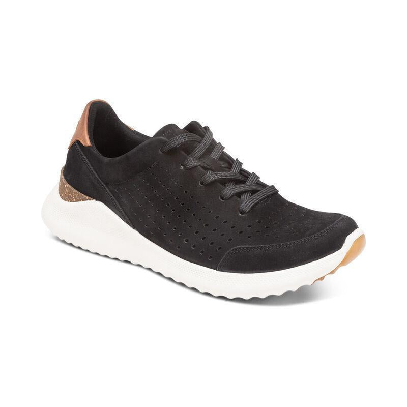A black sneaker with a white bottom on a white background
