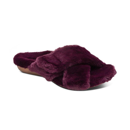A purple fuzzy sandal slipper on a white background