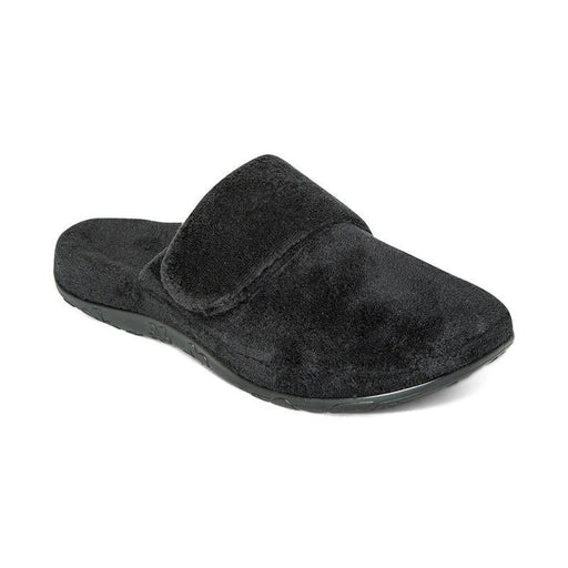 A black fuzzy slipper on a white background