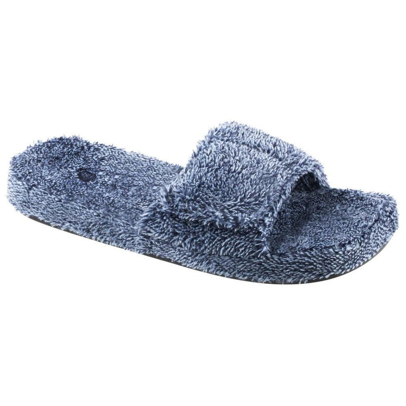 A blue fuzzy slide slipper on a white background