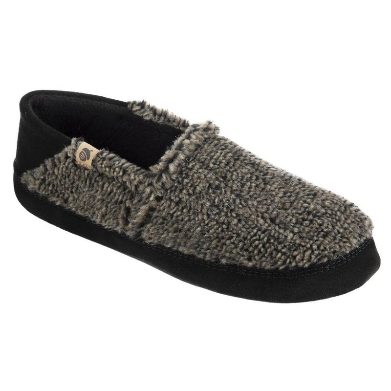 A fuzzy gray slipper with a black bottom on a white background