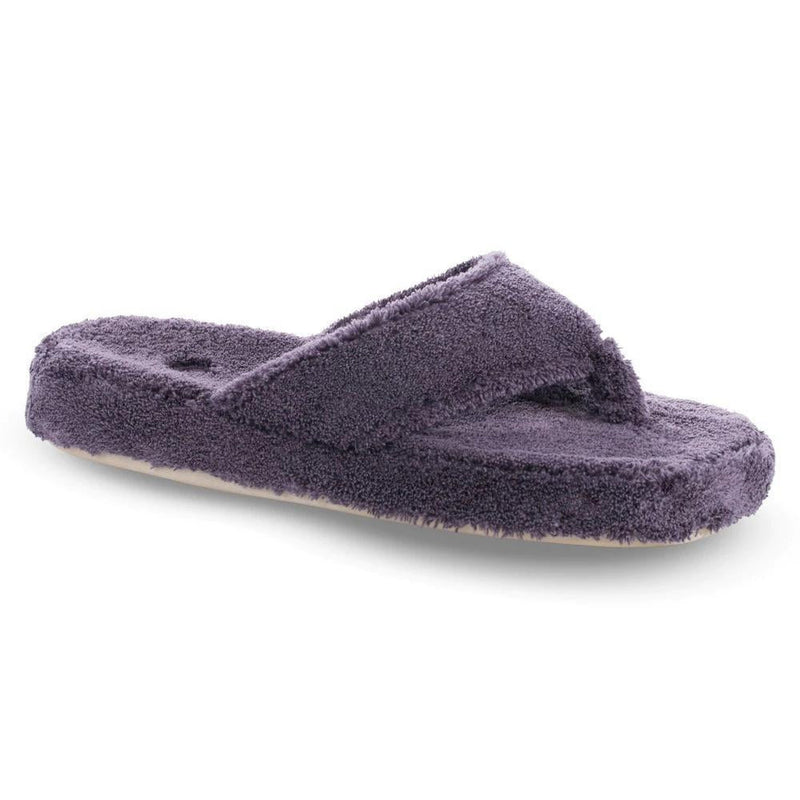 A purple fuzzy flip flop on a white background