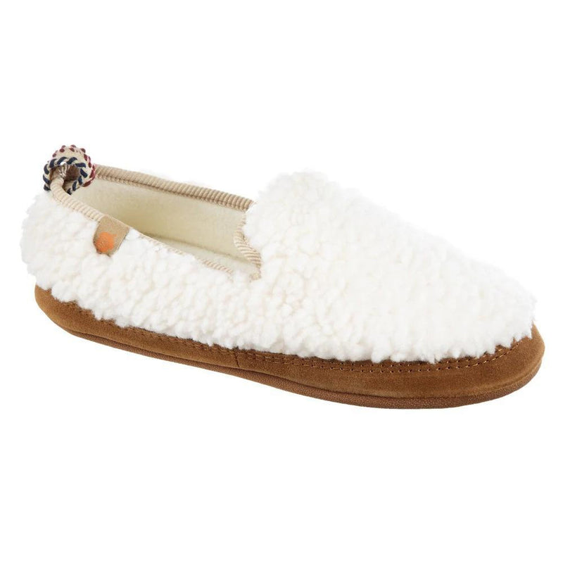 A fuzzy white slipper with a brown bottom on a white background