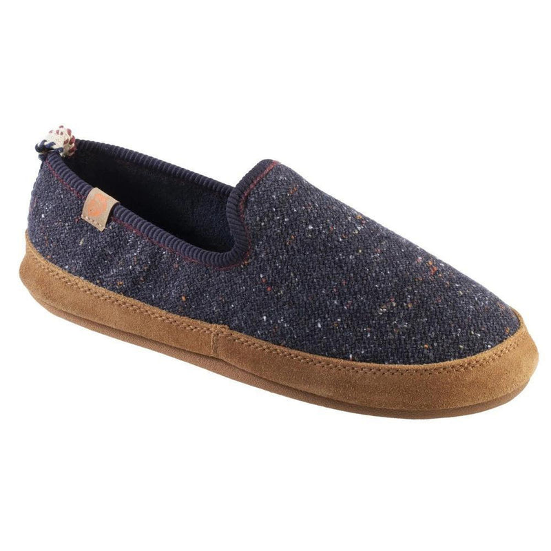A blue slipper with a brown bottom on a white background