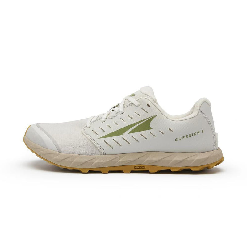 A white running shoe with a brown bottom on a white background