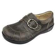 Brown leather shoe with a buckle on a white background