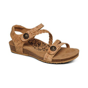 A brown cork sandal on a white background