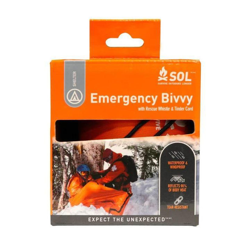 An orange box with an orange sleeping bag inside on a white background