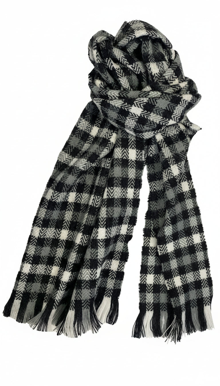 Black and white colored flannel patterned scarf against a white background. 