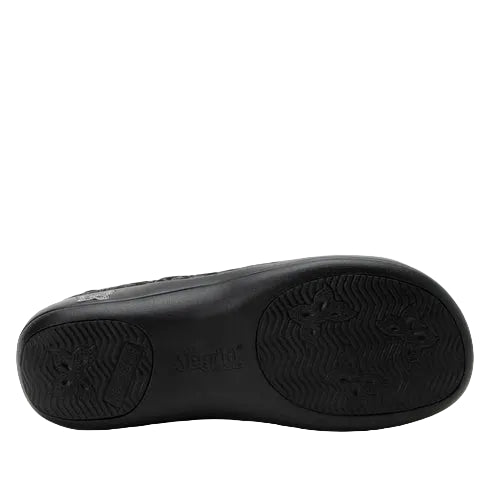 Black shoe sole with brand logo on a light gray background