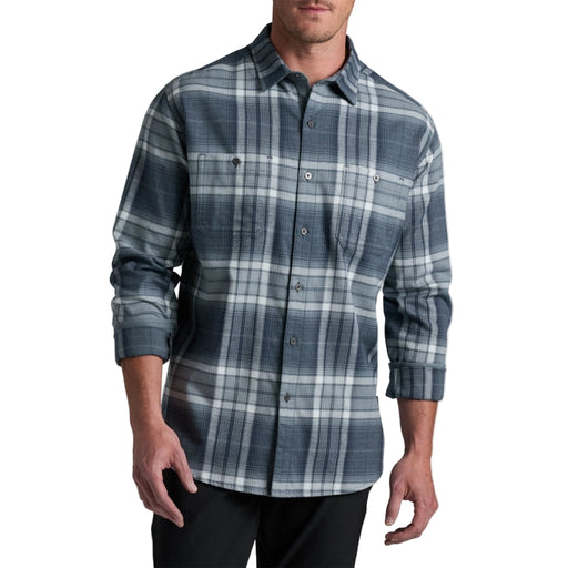 Man wearing a plaid shirt on a white background