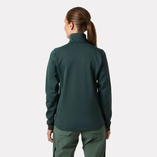 Person wearing a green jacket and pants on a white background