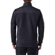 The back of a person wearing a dark navy blue shirt on a white background