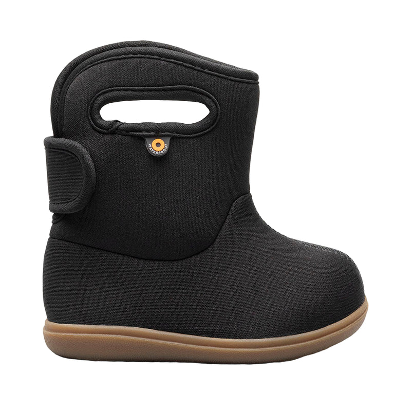 Black boot with a brown sole on a white background