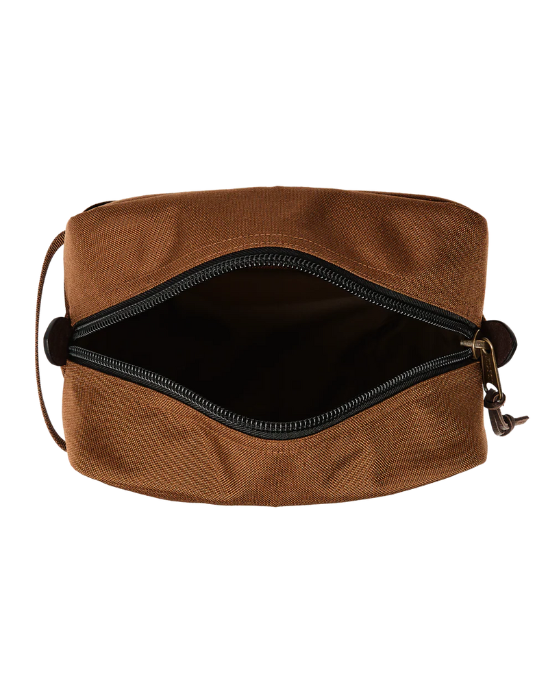 Light brown travel bag with zipper against a white background. 