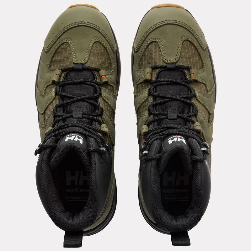 Pair or green and black workboots on a white background