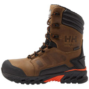 Brown work boot with black and orange sole on a white background