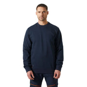 Man wearing a navy blue sweatshirt and pants on a white background