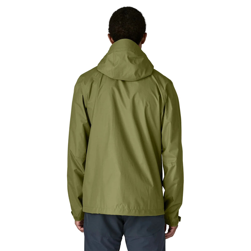 A person from behind wearing a green rain jacket on a white background