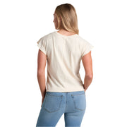 Woman wearing a plain white t-shirt and blue jeans on a white background