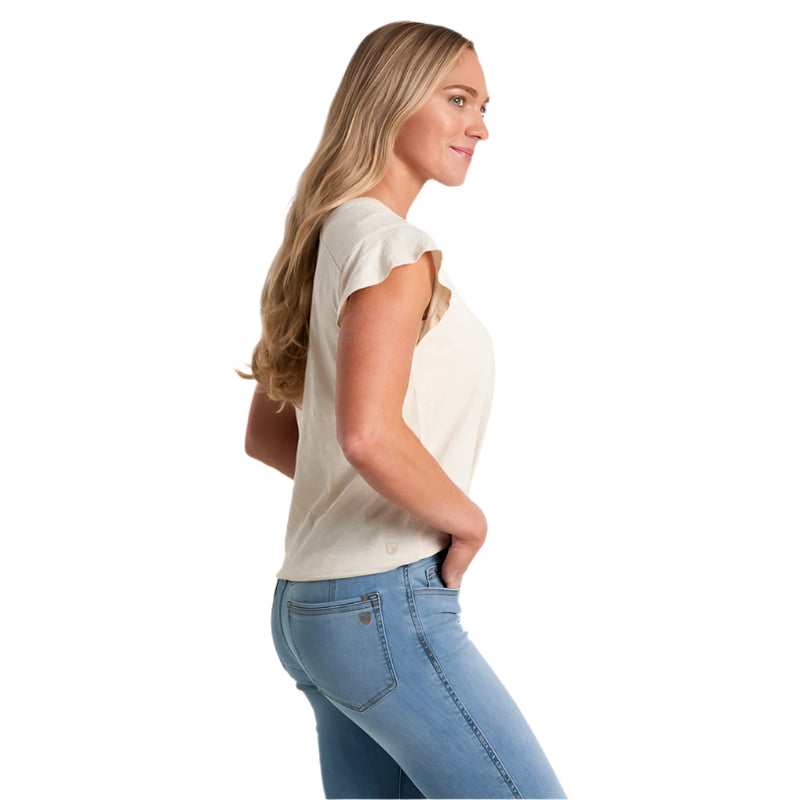 Woman wearing a white t-shirt and blue jeans on a white background