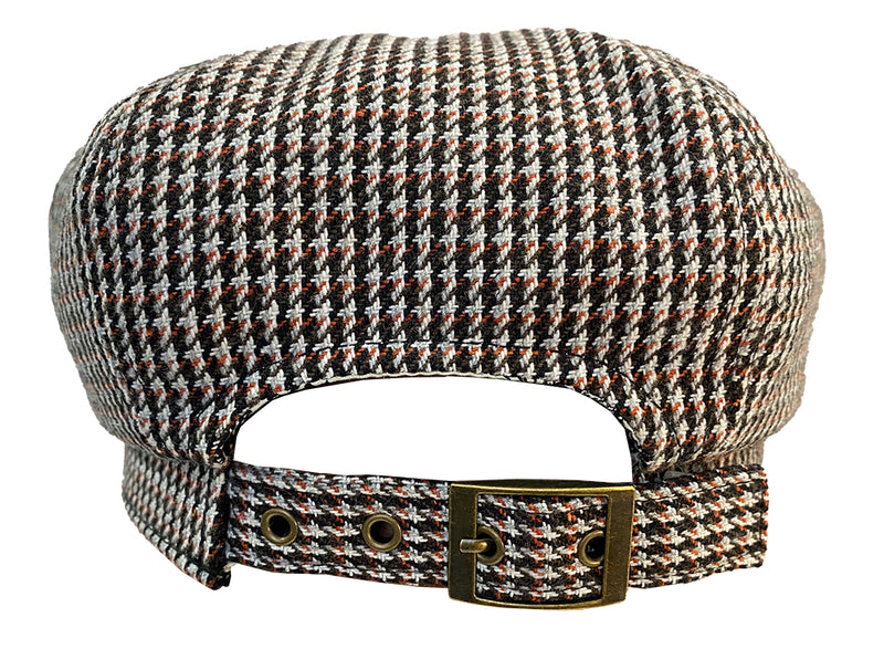 Back view of a black and white houndstooth pattern cabby cap against a white background. 