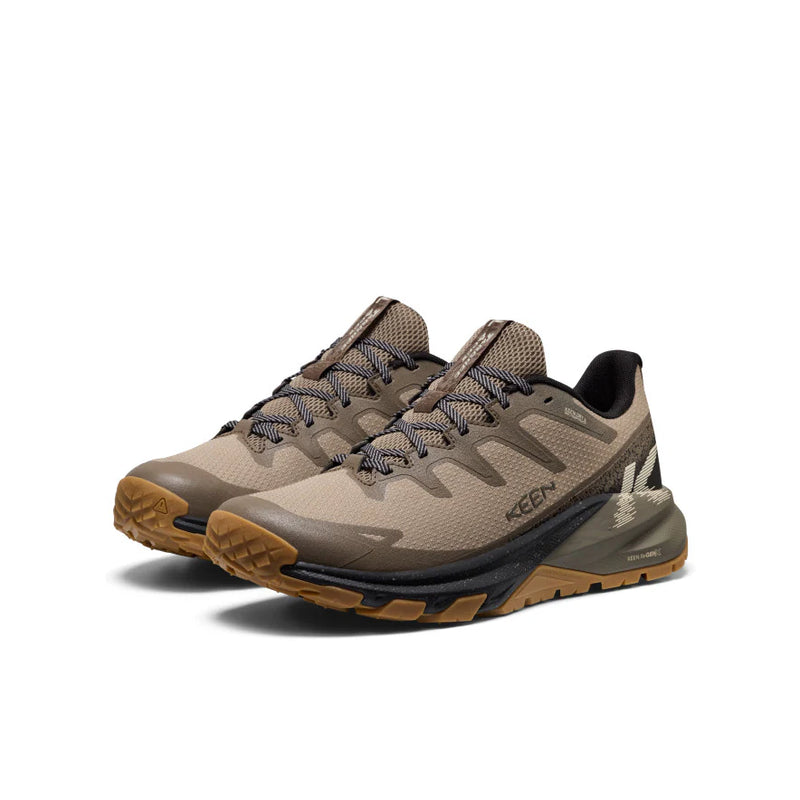 keen Targhee Apex in dusty light brown with darker brown ascents with a black and green sole with brown tread.