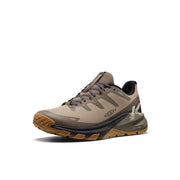 keen Targhee Apex in dusty light brown with darker brown ascents with a black and green sole with brown tread.