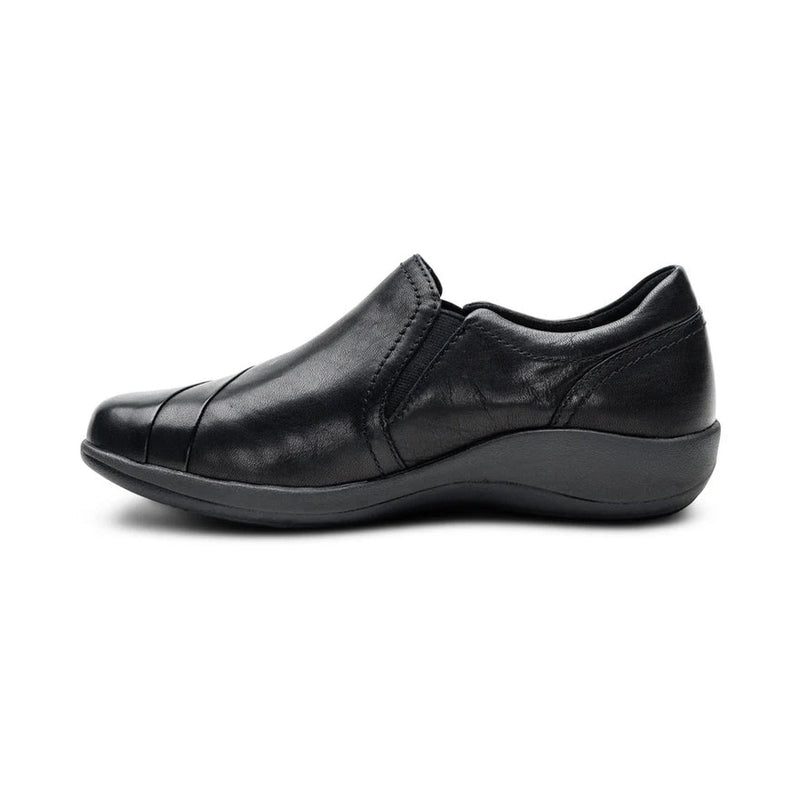 Black leather shoe on a white background.