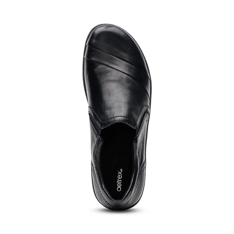 Black leather shoe on a white background.