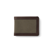 Closed up dark brown leather wallet with a gray fabric accent against a white background. 