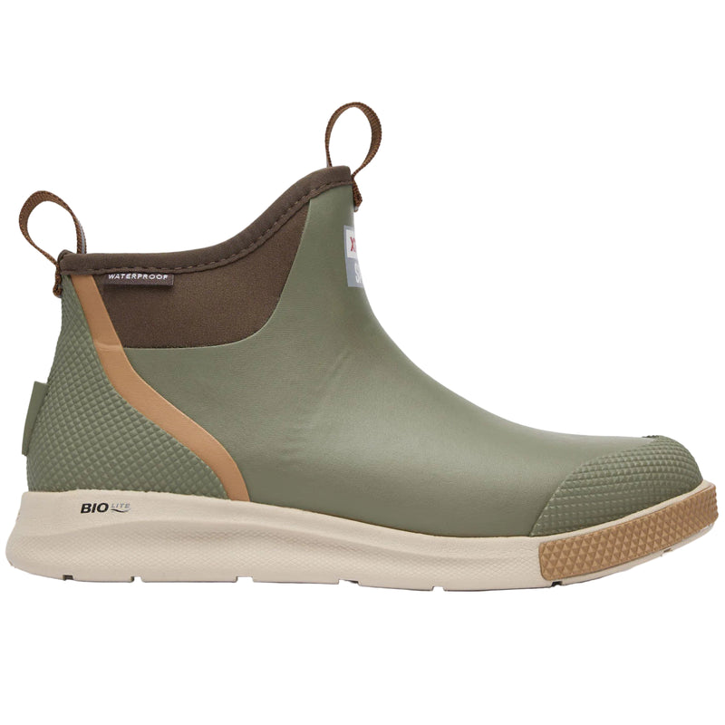 Green rubber boot with brown accents on a white background
